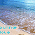 Pixelated beach scene with blue sky, ocean waves, and sandy shore; turquoise text overlays at bottom left.