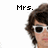 Pixelated image of a person with brown hair and white sunglasses, showing partial text labels above the head.