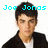 Pixelated image of a person in black jacket and white shirt with cyan text reading 'Joe Jonas is bringin' sexy back!' across four