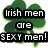Green four-leaf clover with black text boxes containing white pixelated letters reading 'Irish men are SEXY men!' on a transparent background.