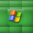 A 2x2 contact sheet of four animated frames showing a Windows XP logo with text variations on a green grid background.