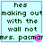 Light blue background with dark green text reading "hes making out with the wall not mrs. pacman" in a pixelated font, framed by pink borders.