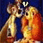 Two identical cartoon figures with blonde hair and orange outfits stand side-by-side against a dark blue background, one holding a white heart above its head.