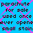 Static pixel art image with blue background and pink X-pattern overlay, displaying repeated text about a parachute for sale.