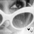 Black-and-white close-up of a person wearing white sunglasses with large oval lenses, showing eye and nose details across four