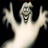 Animated figure with pale skin and messy hair raises both arms in a gesture, mouth open wide showing teeth.