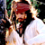 Animated contact sheet showing two frames of a character with long hair and red bandana in white shirt, alongside CoolBuddy.com logo on blue background