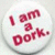 A circular icon with a light gray gradient background displays the phrase "I am a pork." in red pixelated text.