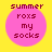 Four identical pink circular icons on a yellow background, each containing pixelated text reading 'summer roxs my socks' in dark red.
