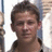 A pixelated image divided into four quadrants with a person in the top-left, blue backgrounds in top-right and bottom-left, and gray in bottom-right.