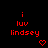 Red pixelated text 'i luv lindsey' with a red heart symbol on black background, arranged in three per instance
