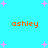 Pixelated orange text "ashley" repeats across a cyan background with scattered pink plus signs, no visible animation changes.