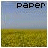 Two side-by-side static images display pixelated text over a field and sky background, each with distinct word labels.