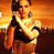 Pixelated static image of a character in motion against an orange gradient background with visible dithering and low-resolution artifacts.