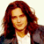 A 2x2 contact sheet of a pixelated animated icon featuring a person with long red hair and a dark jacket over a white shirt, alongside text reading "CoolBuddy.com" on a blue background in one frame.