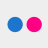 Two solid-colored circular shapes side-by-side on a light gray background, left blue, right magenta, no text or additional elements visible.