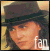 A person wearing a dark top hat with a black band, light brown hair visible beneath the hat, and the word 'fan' in white lowercase letters overlaid on the lower portion of the image.
