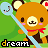 Pixelated brown bear with red scarf holds light blue spoon; green background has repeating 'dream' text in black and cyan.