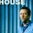 A pixelated image of a person in a light blue shirt against vertical blue stripes with repeated 'HOUSE' text above.