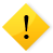 Yellow diamond-shaped icon with black exclamation mark and dot on gray background.