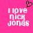 Pixelated pink background with white text reading "I love NICK JONAS" and a black pixel-art heart above the left side of the text.