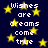 Dark blue background with yellow stars and repeated white text 'Wishes are dreams come true' in pixelated font.