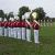 Two side-by-side images show a marching band on grass and people clapping, with red text reading "Marching Band ROCKS!!" below.