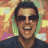A pixelated image of a person in four distinct poses against a colorful abstract background with yellow, green, and pink tones.