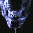 Static pixelated icon of a stylized blue and white skull-like face with glowing eyes against black background, rendered in low-resolution digital art style.