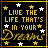 Animated pixel art with black background, yellow and white stars, and text 'LIVE THE LIFE THAT'S IN YOUR DREAM' in gold lettering.