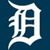 A split-screen image with a white stylized 'D' on dark blue left and an orange tiger head pattern on blue-and-white right.