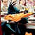Animated contact sheet showing three frames of a cartoon duck character with an orange beak and black body against varying backgrounds including grass, pink, and white patterns.