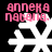 Pixelated pink text 'anneka natana.' above white snowflake icons on black background, with visible animation changes between frames.