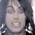 Two pixelated images of a person with dark hair, one above the other, with red text on a black background reading "i love you ronnie".