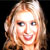 Static 50x50 pixel icon showing a close-up of a person with light brown hair and fair skin against a dark background, rendered in low-resolution pixel art style.