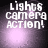 Pixelated text "Lights camera action!" in white with a purple glow on a dark background, displayed in a of four with subtle animation changes