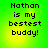 Green background with yellow gradient center displaying black pixelated text 'Nathan is my bestest buddy!' in four identical quadrants.