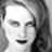 Static grayscale pixelated image of a person's face with visible facial features and hair, rendered in low resolution at 48x48 pixels.