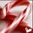 A four- shows a red satin ribbon, a wrapped gift with 'merry' text, a white gift box with red ribbon, and a blank