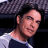 A 48x48 pixel buddy icon featuring a person with dark hair and a gray hat on the left, next to green text reading "Original Icons .com" on a solid green background.