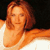 Static pixelated image of a person with reddish-brown hair wearing a white top against dark background, rendered in orange-toned palette with visible dithering and low-resolution artifacts.