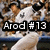 Baseball player in white uniform with dark cap and number 13, text overlays reading 'Arod #13', 'yankees', and 'BOOM!!' on a blurred stadium background.