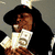 Pixelated image of a person holding money with overlaid text fragments including 'in the vp scellon', 'krislon surks', and 'I need a windixie grocery bag full o money'.
