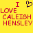 Yellow background with red pixelated text reading "I LOVE CALEIGH HENSLEY" and a black pixelated heart symbol above the text.