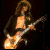 repeated 'Jimmy' text with animated heart symbols and a static guitar player image in the top-left corner