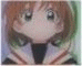 Anime-style character with brown hair and green eyes in a school uniform, shown across three with changing facial expressions