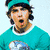 A person in a teal shirt and green headband appears in two side-by-side with a group photo and text overlay below