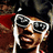 A pixelated image of a person wearing white sunglasses and earphones against a blue background with pink text reading "Soulja Boy & Nene".