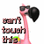 Pixelated pink flamingo with black sunglasses and a large black heart-shaped prop, standing against white background.