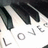 Pixelated image showing partial dark shapes and light background with faint numerical digits '0', '1', '2' visible in low resolution.